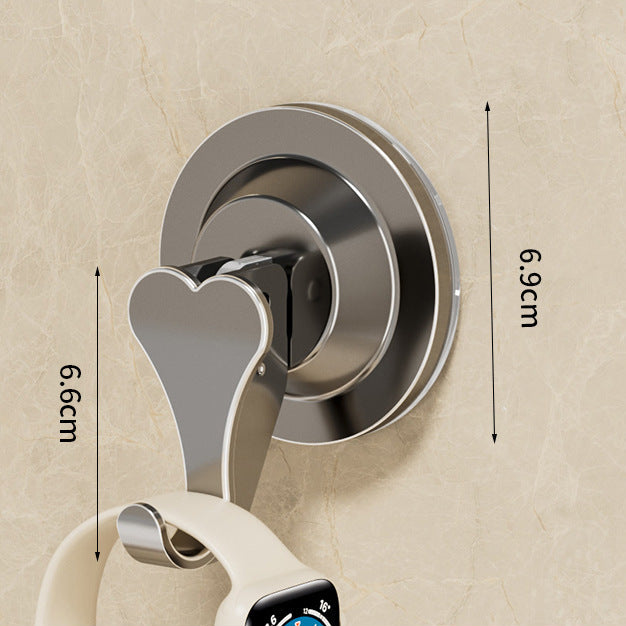 Heart-shaped hook with dimensions on a beige background